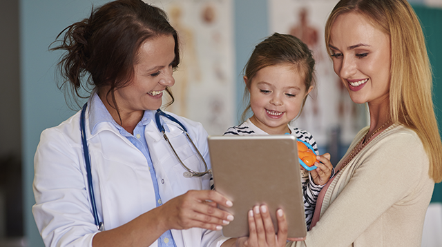 Female doctor and little girl